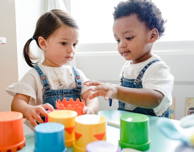 Two Children Engaged in Playtime Activities